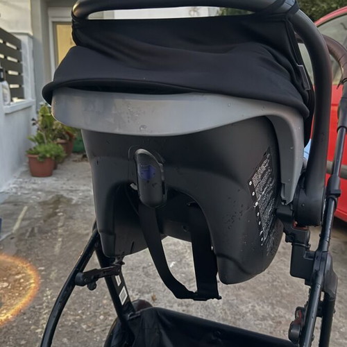 Kinderkraft 3-in-1 grey stroller with car seat