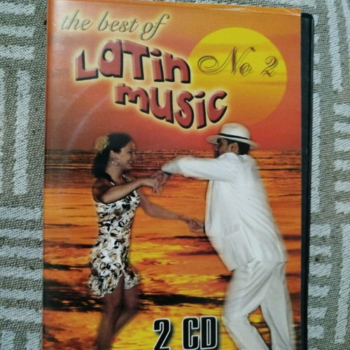Latin music CD like new, 2 CDs