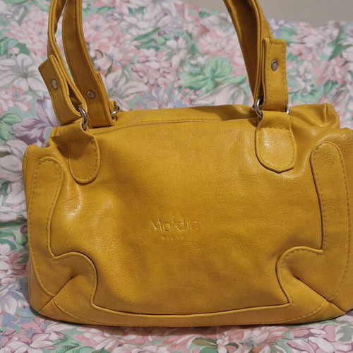Women's mustard small hand bag used