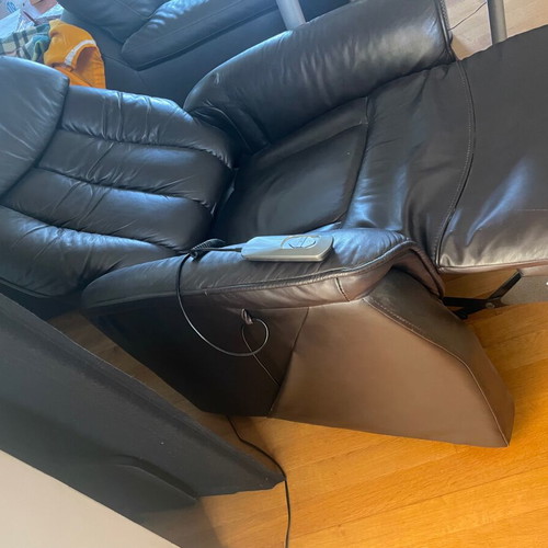 Armchair used, leather with relax function