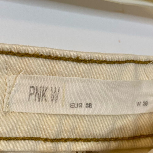 Pink Woman mini denim skirt with ripped hem like new, size 38