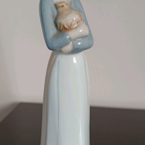 Porcelain figure of young woman like new, height 29 cm