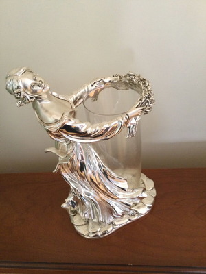 Decorative silver-plated item like new with flower vase