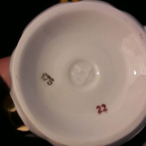 Vintage porcelain teapot and sugar bowl set like new