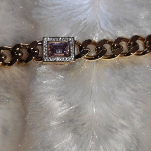 Women's stainless steel hand chain and earrings new, gold tone with pink stones