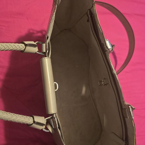 Mikael Kors handbag used, gray, large with adjustable zippers