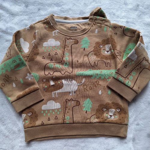 Set of 7 used baby jumpers 12-18 months