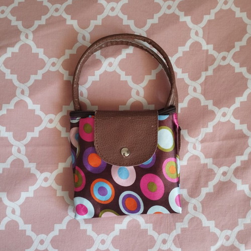 Brown handbag with colorful patterns used, medium size