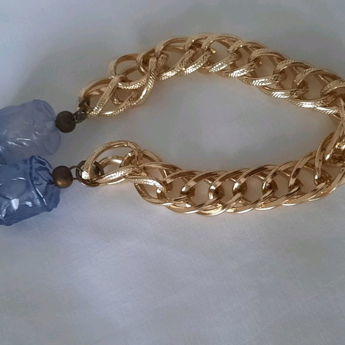 Elegant necklace with a gold-plated chain and beads.
