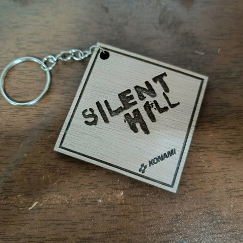 Wooden handmade Silent Hill keychain with laser engraving made to order