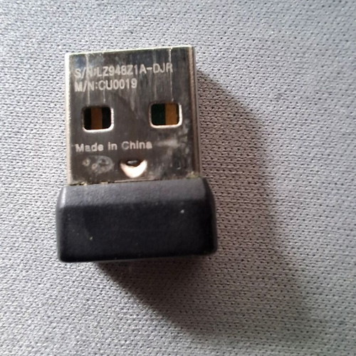 Logitech CU0019 USB adapter used for compatible mice and keyboards