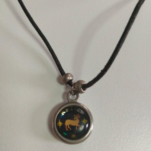 Necklace with Aries zodiac sign like new, pendant with cord