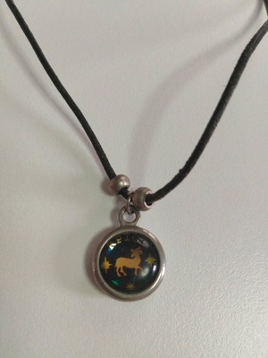 Necklace with Aries zodiac sign like new, pendant with cord
