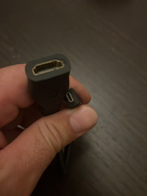 Micro-HDMI to HDMI adapter used for cameras and tablets