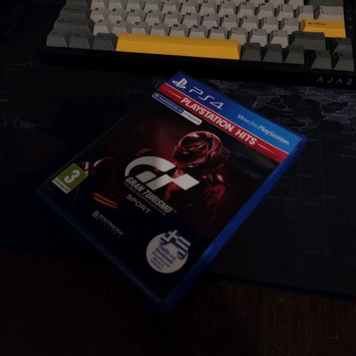 Keyboard and mouse used with Gran Turismo game