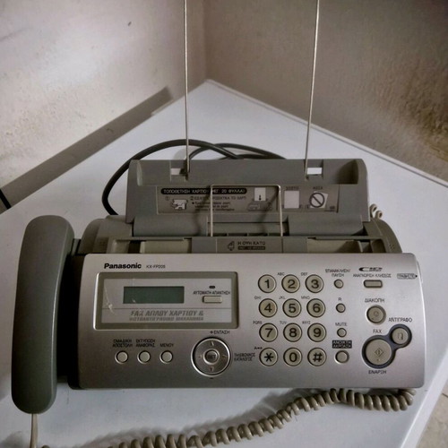 Telephone with fax and printer like new, gray, wired