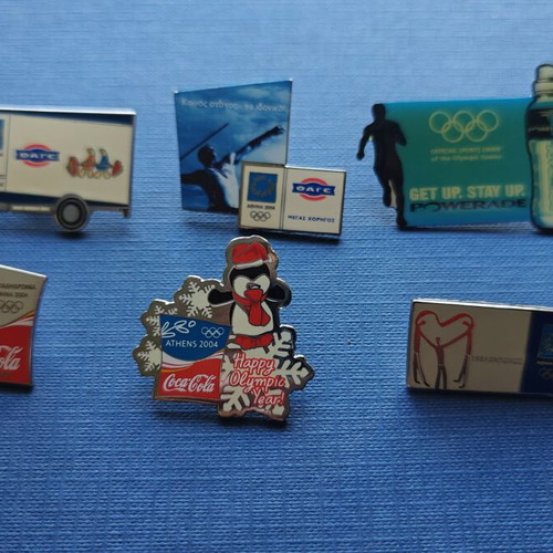 Athens 2004 Olympic Pins collection with official Ensimon catalog