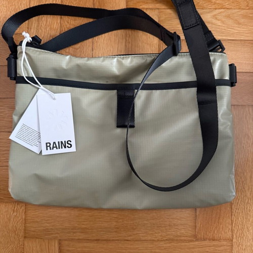 Rains crossbody bag new, waterproof, soft khaki color