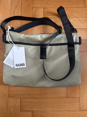 Rains crossbody bag new, waterproof, soft khaki color