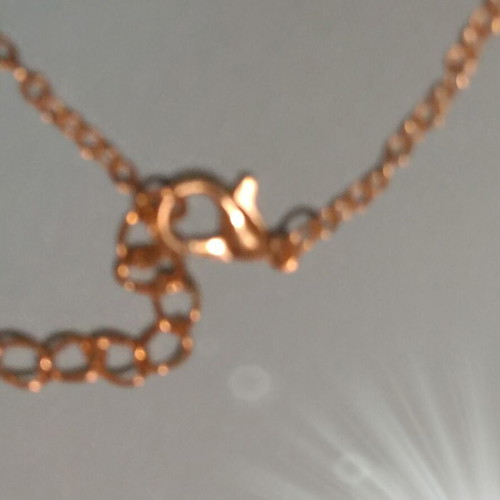 Gold-colored heart bracelet with chain