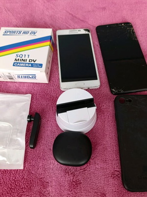 Lot of mobile phones, camera, case, hands free like new and more