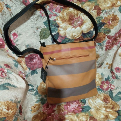Bag with adjustable strap with minor corner wear