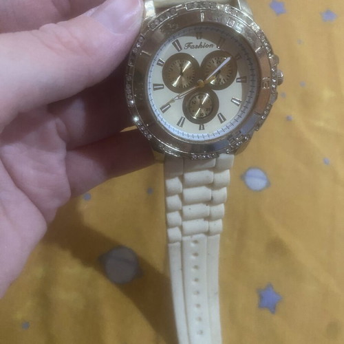Women's watch like new, simple, gold color
