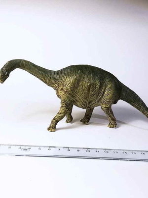 Plastic dinosaur figure used, toy animal