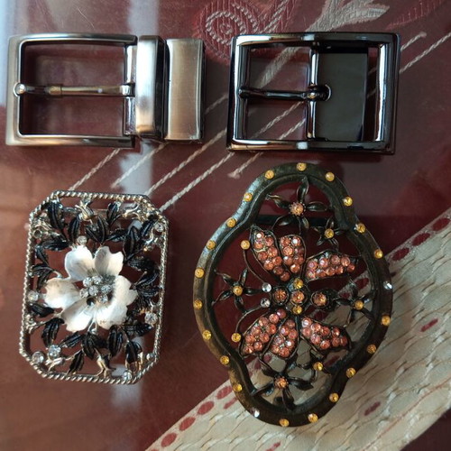 Four belt buckles