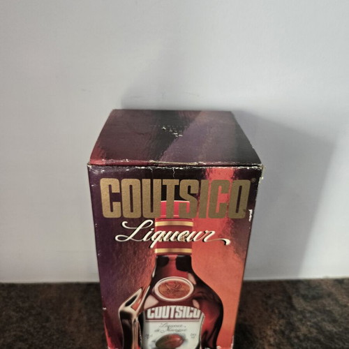 Coutsico vintage mango liqueur bottle, sealed