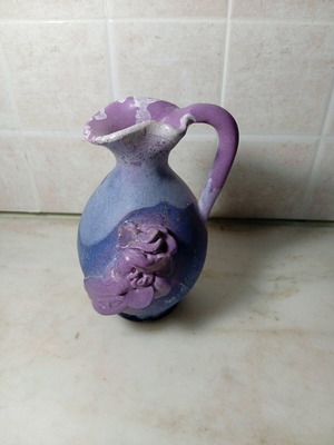 Decorative ceramic jug like new with embossed roses in purple and blue shades