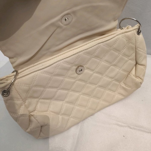 Women's shoulder bag like new, milky color with silver details