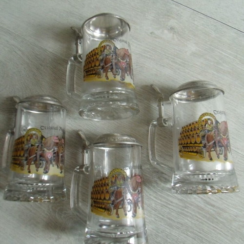 Set of 4 old glass beer steins with metal lids used
