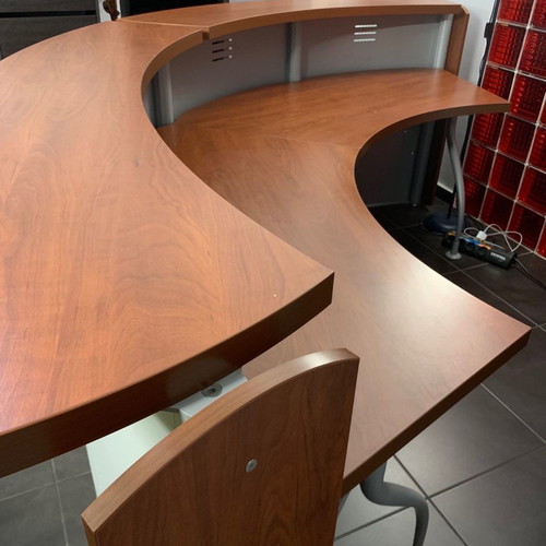 Reception desk used with metal perforated front panel