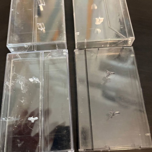 Set of 4 transparent plastic audio cassette cases