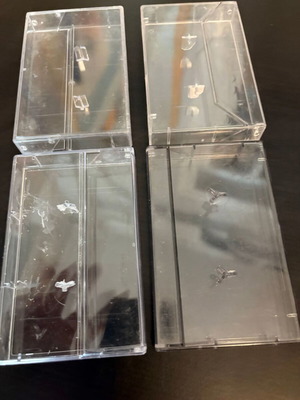 Set of 4 transparent plastic audio cassette cases