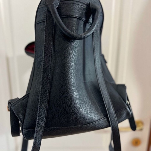 Black backpack used with studs