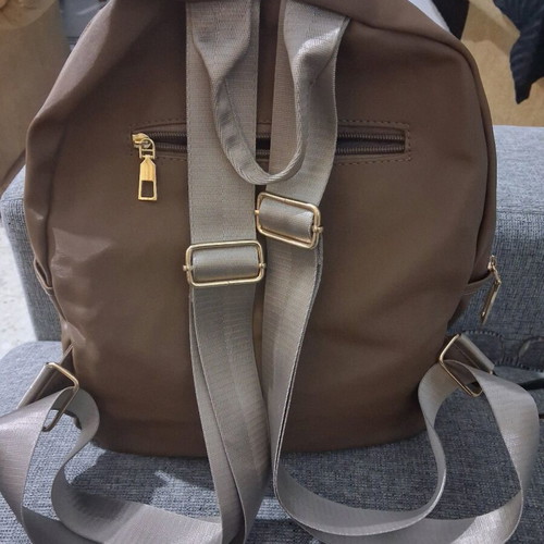 Backpack like new brown with gold zippers