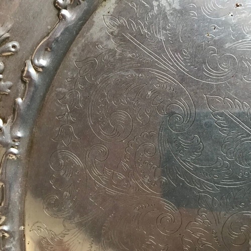 Silver-plated round disc used with age damage
