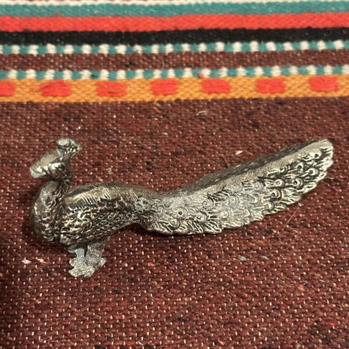 Vintage metal decorative peacock used