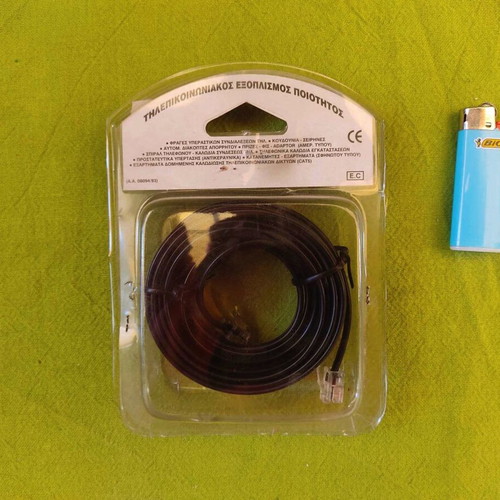 Telephone cable 6m new, black with clips