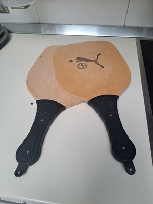 Wooden rackets used, length 41.5cm, width 22cm