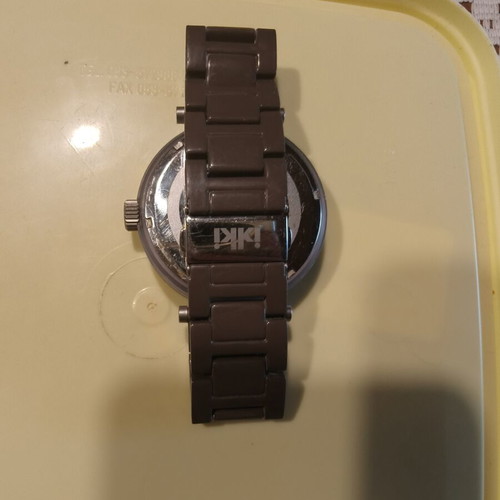 IKI Men's Quartz Watch with Brown Dial and Roman Numerals