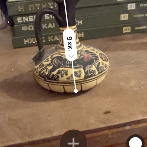 Small ceramic vase museum replica