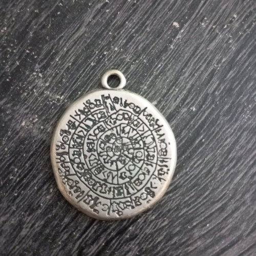 Phaistos Disc pendant like new, silver color