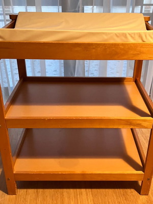 Wooden multipurpose changing table used with mattress