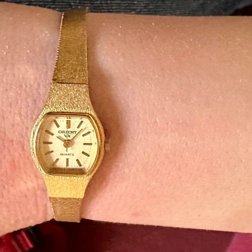 Vintage Orient VX Quartz women's watch like new, gold-tone