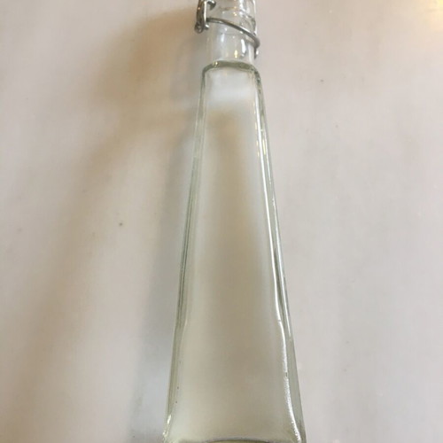 Small glass bottle with airtight seal like new