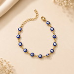 Gold bracelet with blue evil eye beads new