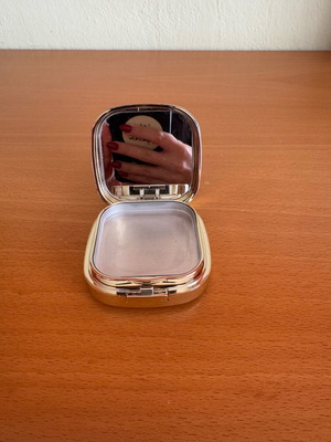 Dolce & Gabbana powder case used
